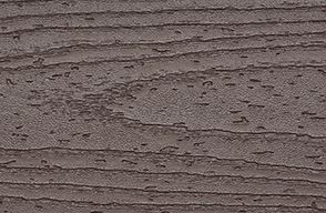 Un échantillon de couleur de lame de plancher composite Trex Transcend brun foncé Vintage Lantern