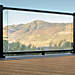Trex Signature® Glass Railing with Charcoal Black frame.