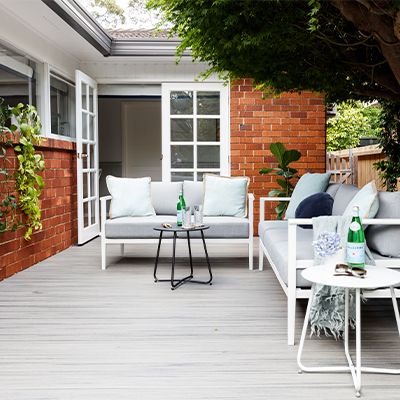 Trex Enhance composite decking in Clam Shell grey and Beach Dune brown