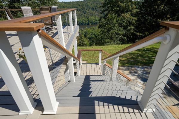 Stylish Trex deck with seamless stair design, offering a smooth transition from your home to your outdoor space with lasting durability.