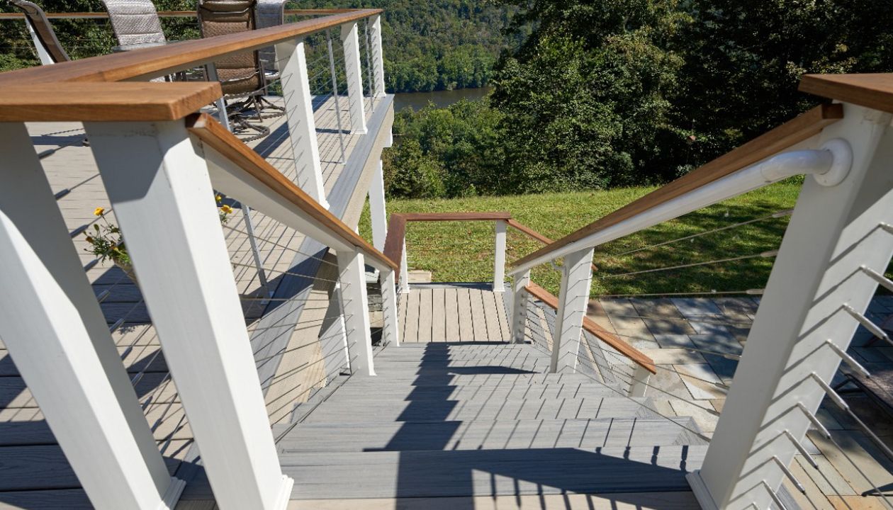 Stylish Trex deck with seamless stair design, offering a smooth transition from your home to your outdoor space with lasting durability.