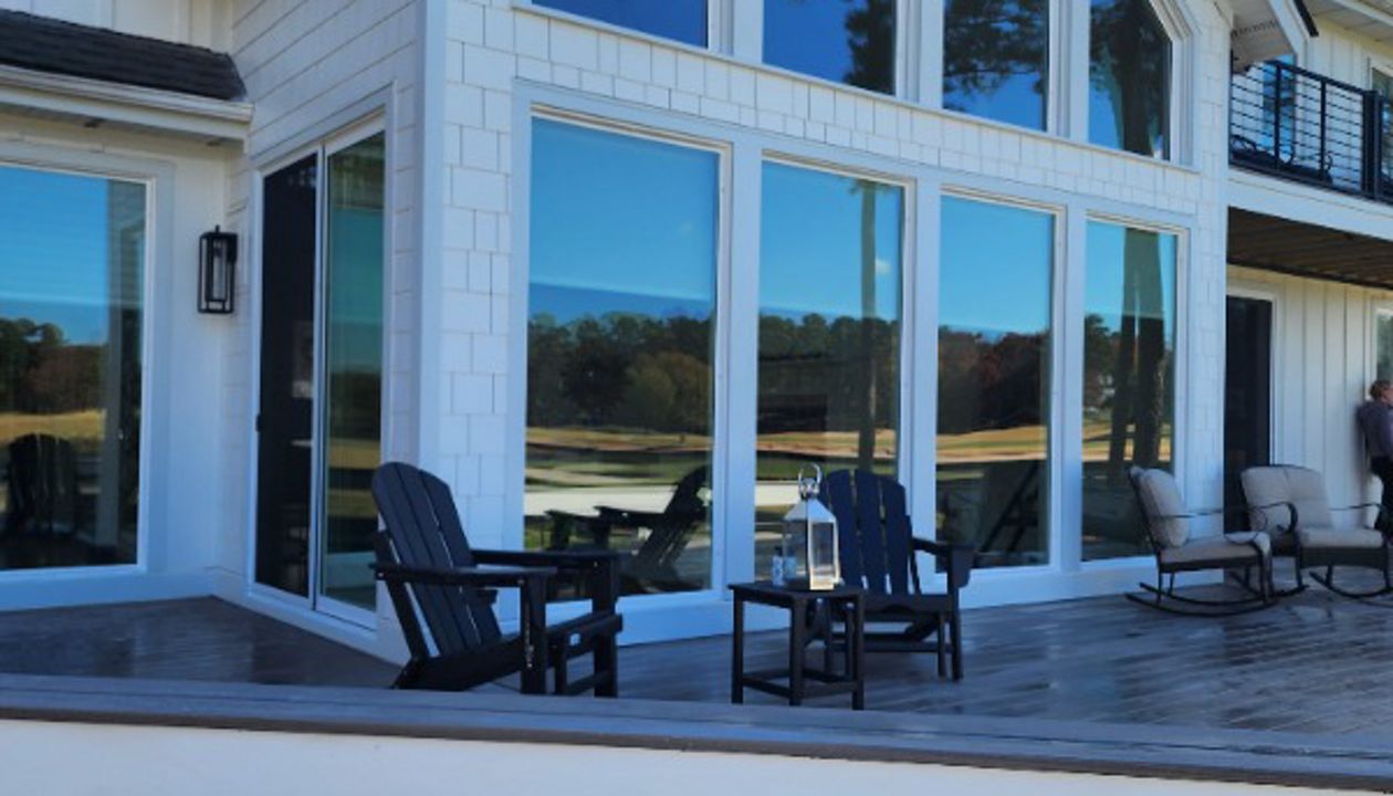 Custom Wrap-Around Bench Surrounding a Beautiful Trex Transcend Linage Biscayne Deck