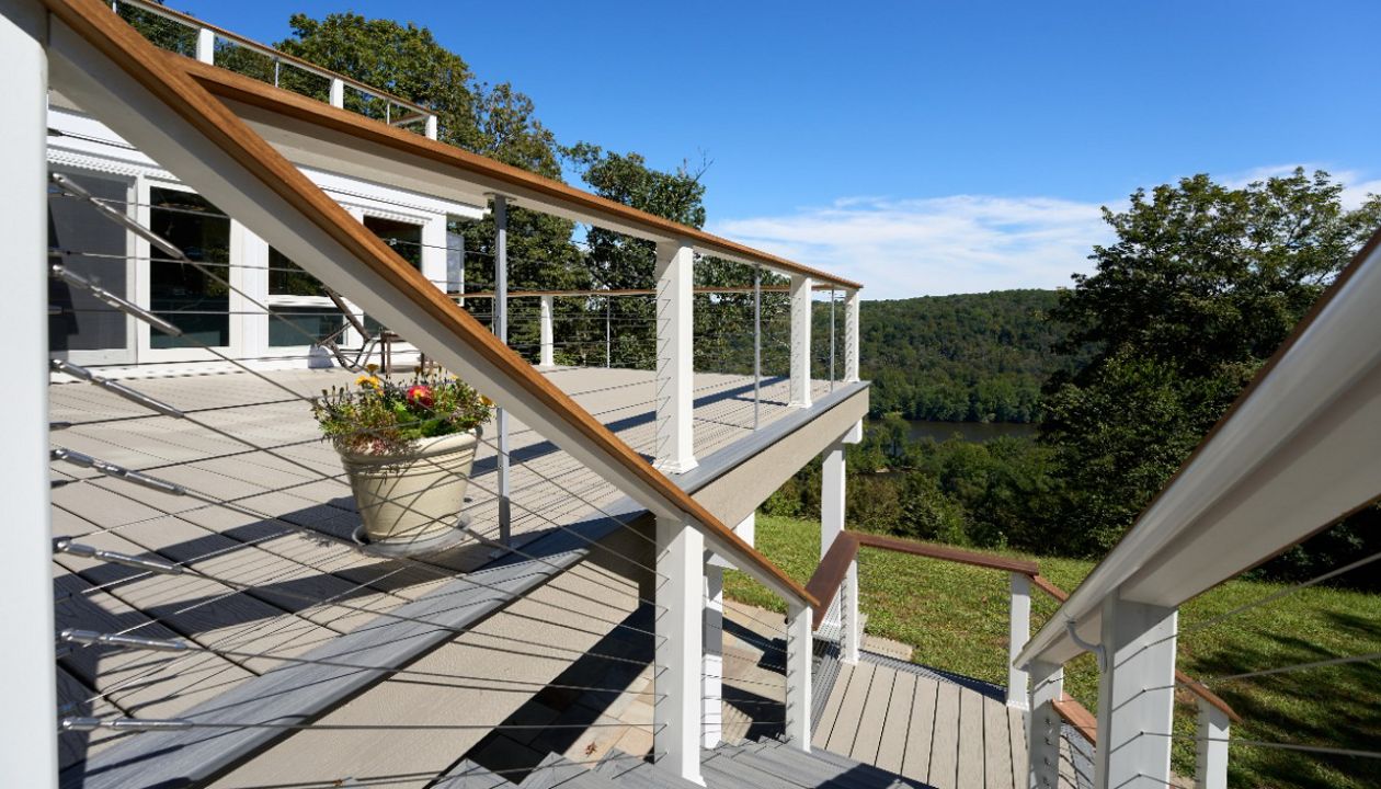 Experience outdoor living at its finest with this beautiful Trex deck, offering a stunning view and low maintenance elegance for years to come.