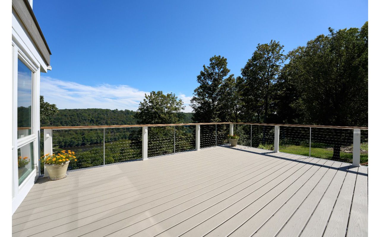 Expansive Trex deck designed for ultimate outdoor living, offering plenty of space for relaxation, entertainment, and lasting beauty.