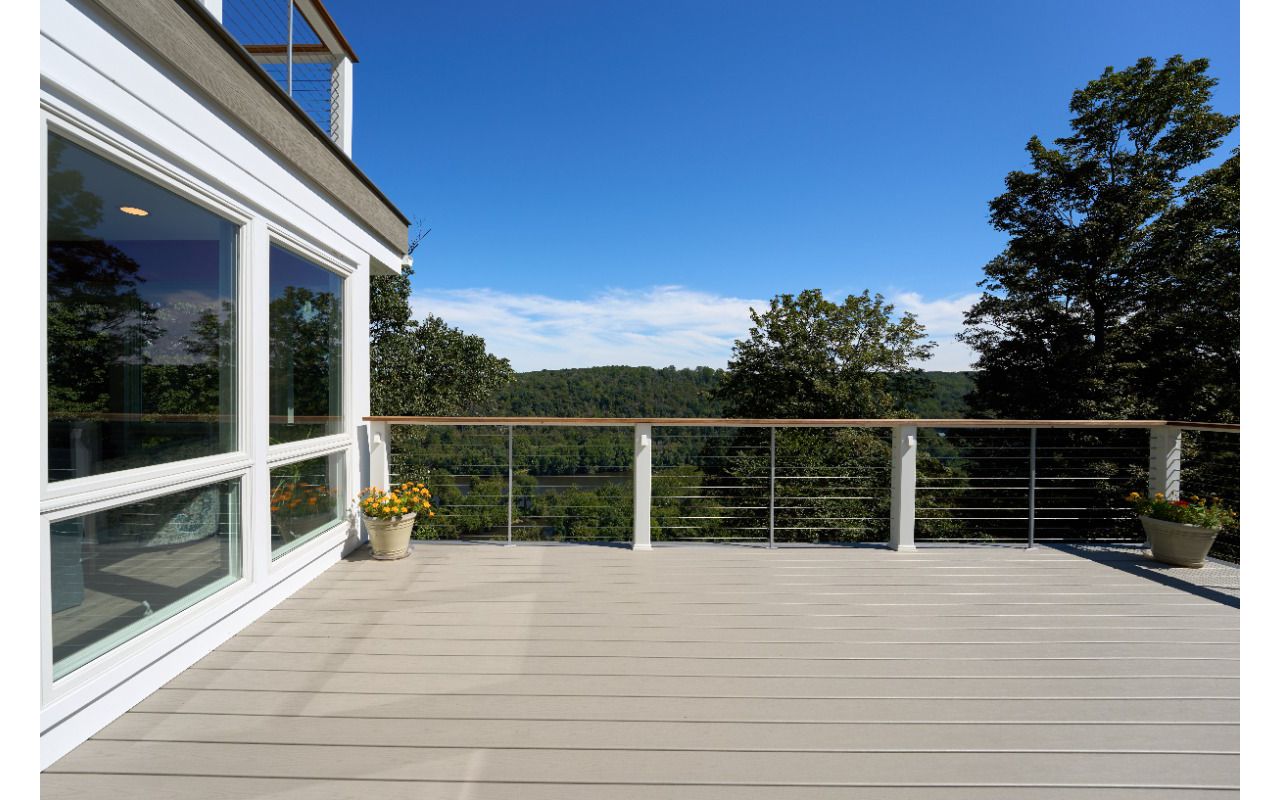 Spacious Trex deck built for entertaining, combining modern style with low maintenance durability for endless outdoor enjoyment