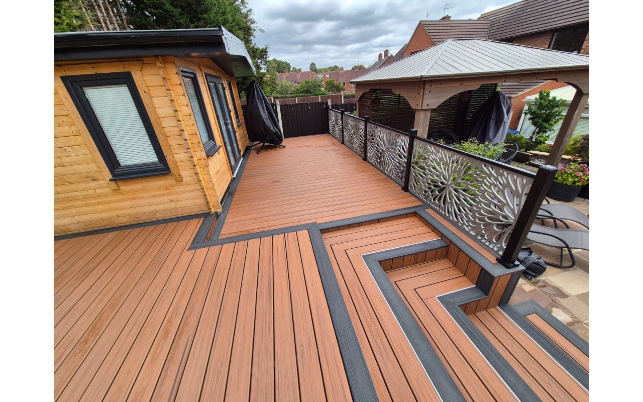 Transcend Tiki Torch decking with Enhance Calm Water border…