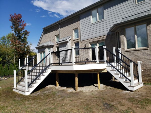 Trex White Facia and Black and white Trex Transcend railings.