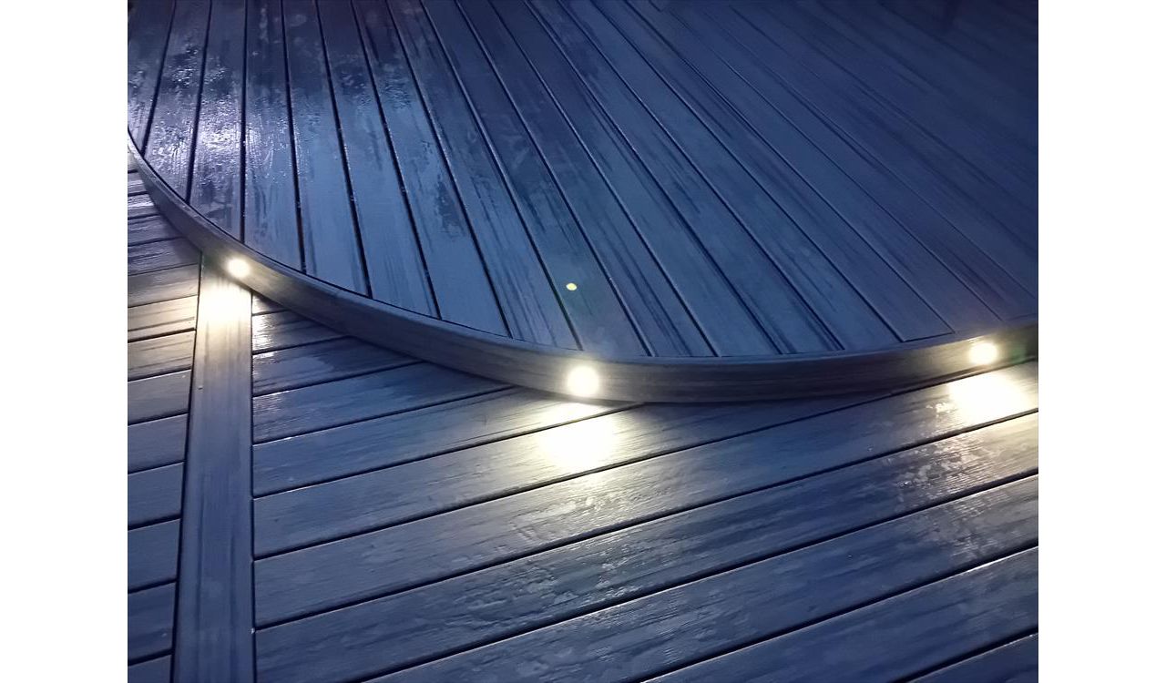 Daylight White spot lights add an extra glow to a deck