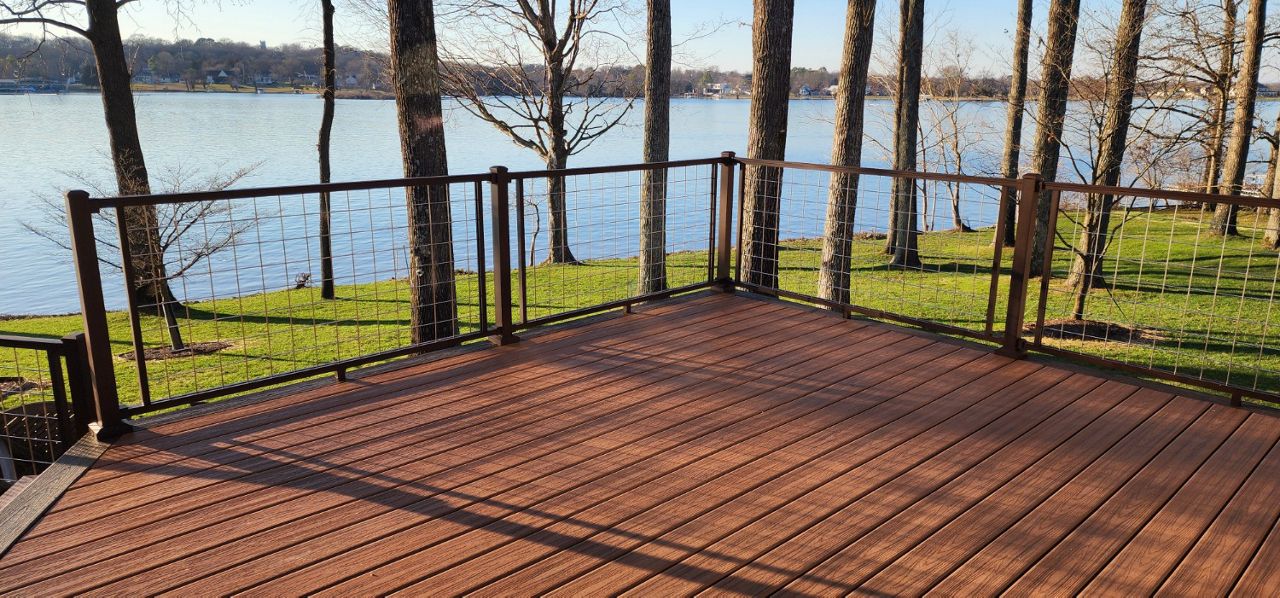 Trex Signature handrails with mesh infill - provides an unobstructed view of the lake
