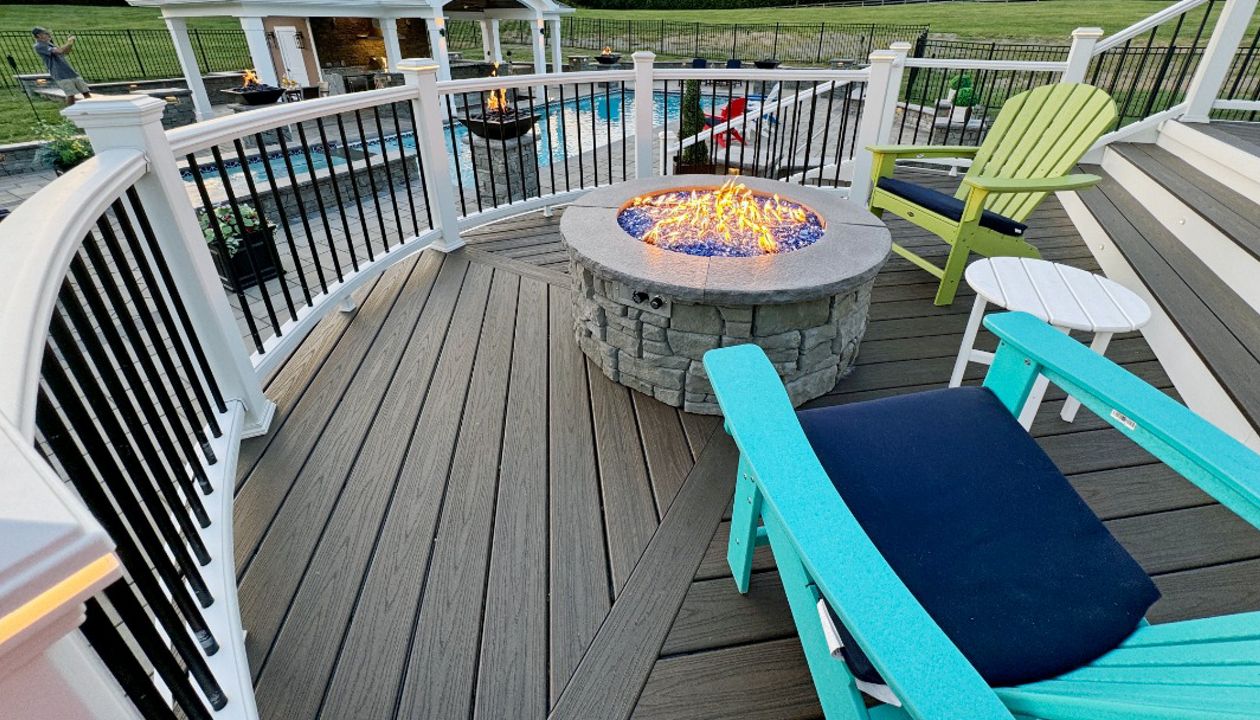 Firepit on Trex deck overlooking pool & pavilion Sandy Spring MD