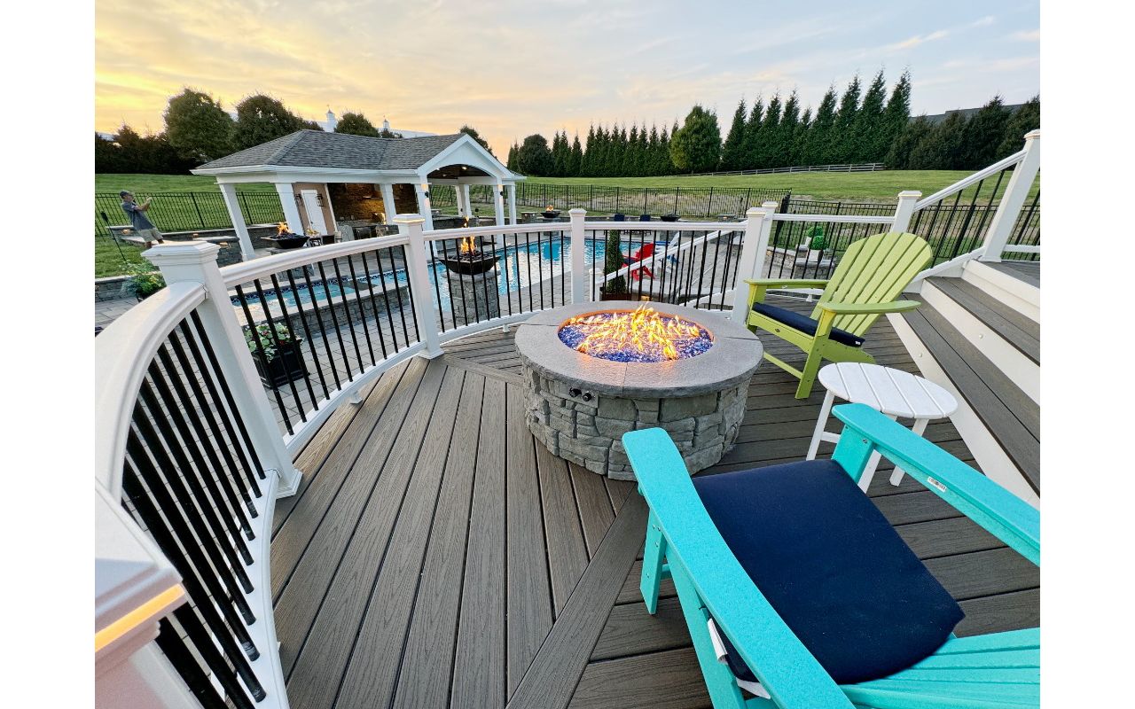 Firepit on Trex deck overlooking pool & pavilion Sandy Spring MD