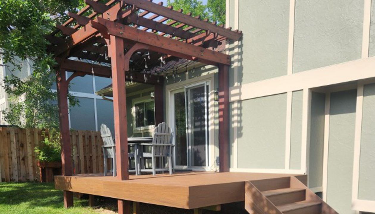 Deck with a pergola for sunny day enjoyment