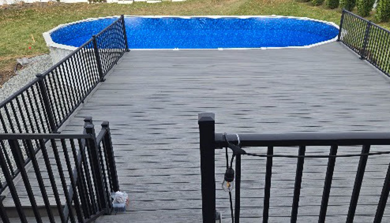 Trex Transcend; Island Mist pool deck  15' out x 21' wide addition to existing deck.