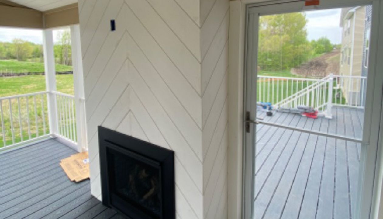 A welcoming retreat featuring white shiplap throughout