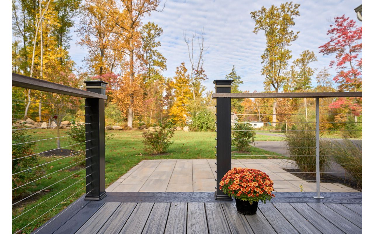 Step into luxury with this Trex deck, where modern design and high-performance materials create the perfect setting for unforgettable moments outdoors.
