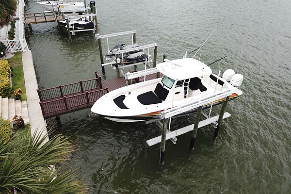 Boat docked at a dock made of Trex decking