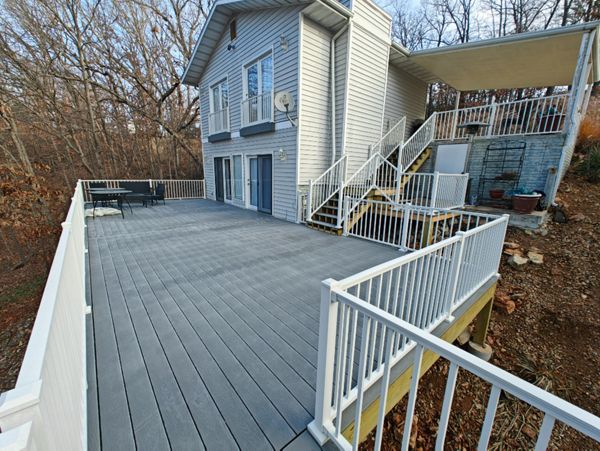 Massive deck using Pebble Gray with Signature railing done in Laurie at Lake of the Ozarks
