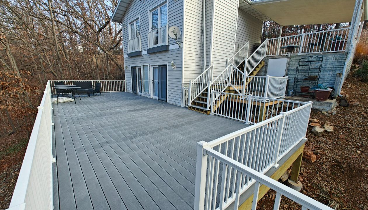Massive deck using Pebble Gray with Signature railing done in Laurie at Lake of the Ozarks