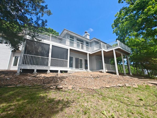 Large Deck using Foggy Wharf with Signature railing done in Lake Ozark, MO at Lake of the Ozarks