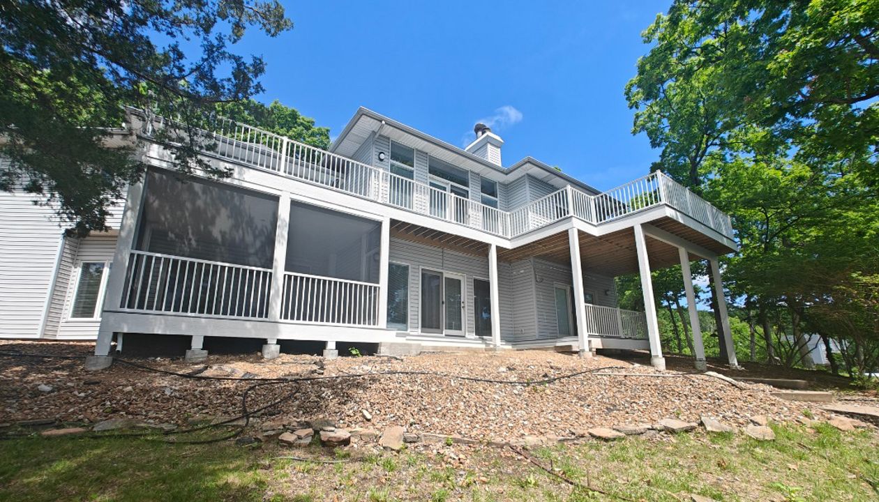 Large Deck using Foggy Wharf with Signature railing done in Lake Ozark, MO at Lake of the Ozarks