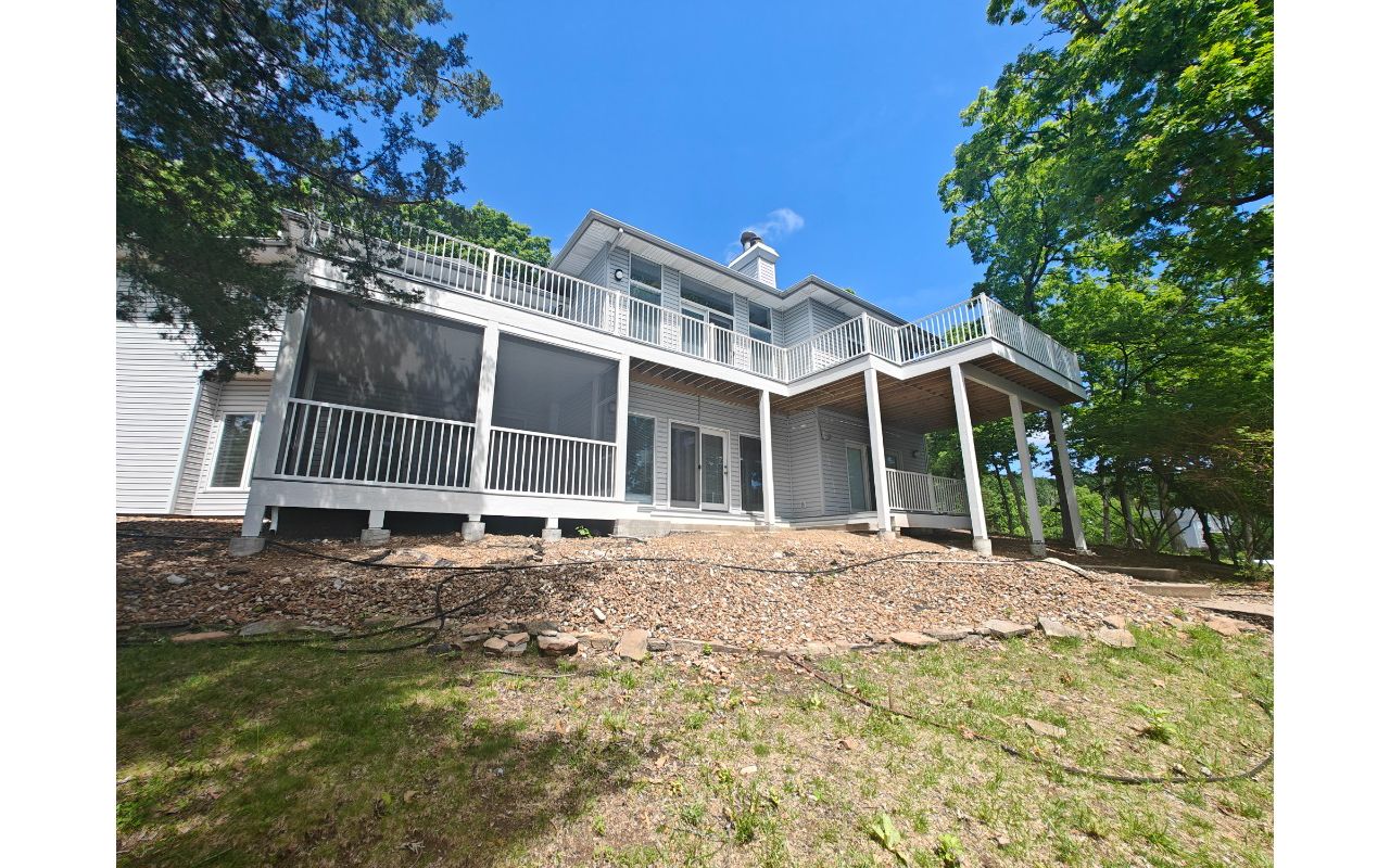 Large Deck using Foggy Wharf with Signature railing done in Lake Ozark, MO at Lake of the Ozarks