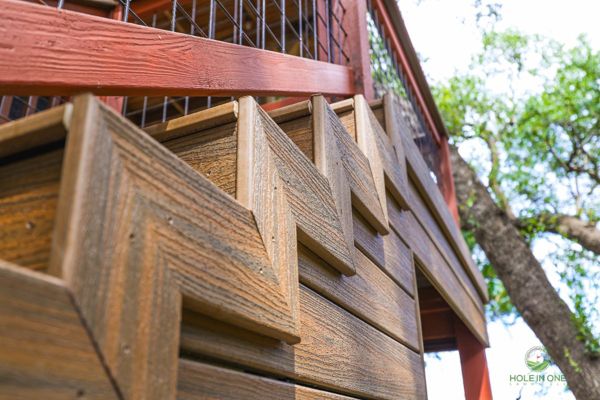Detail of herringbone-pattern Trex skirting under an elevated deck