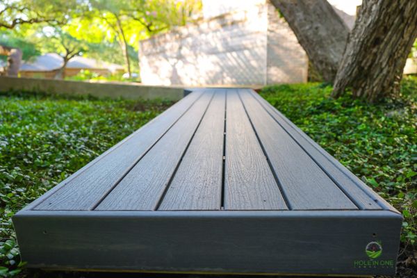 Close-up of a Trex composite boardwalk with a finished fascia edge