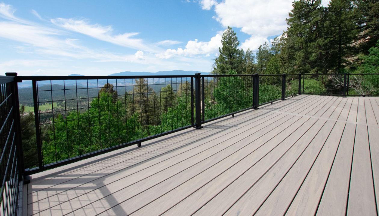 Conifer, CO Trex Lineage deck in Biscayne with steel frame and Trex Signature railing in black