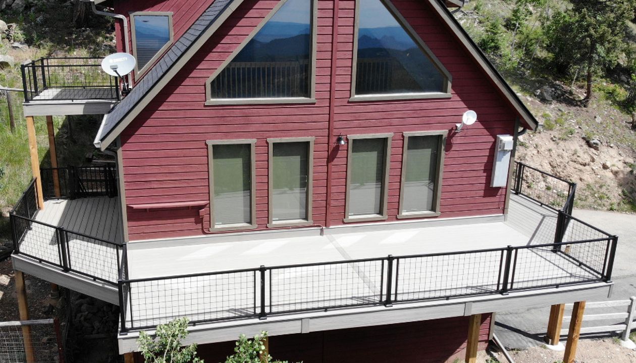 Conifer, CO Trex Lineage deck in Biscayne with steel frame and Trex Signature railing in black