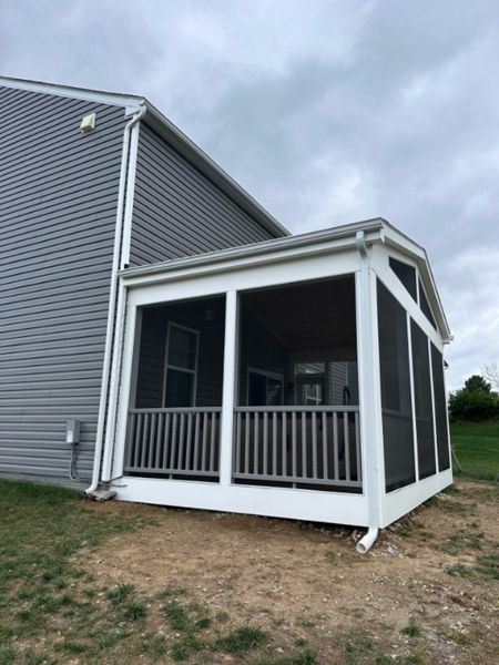 TREX Transcend classic white railing on a screened porch