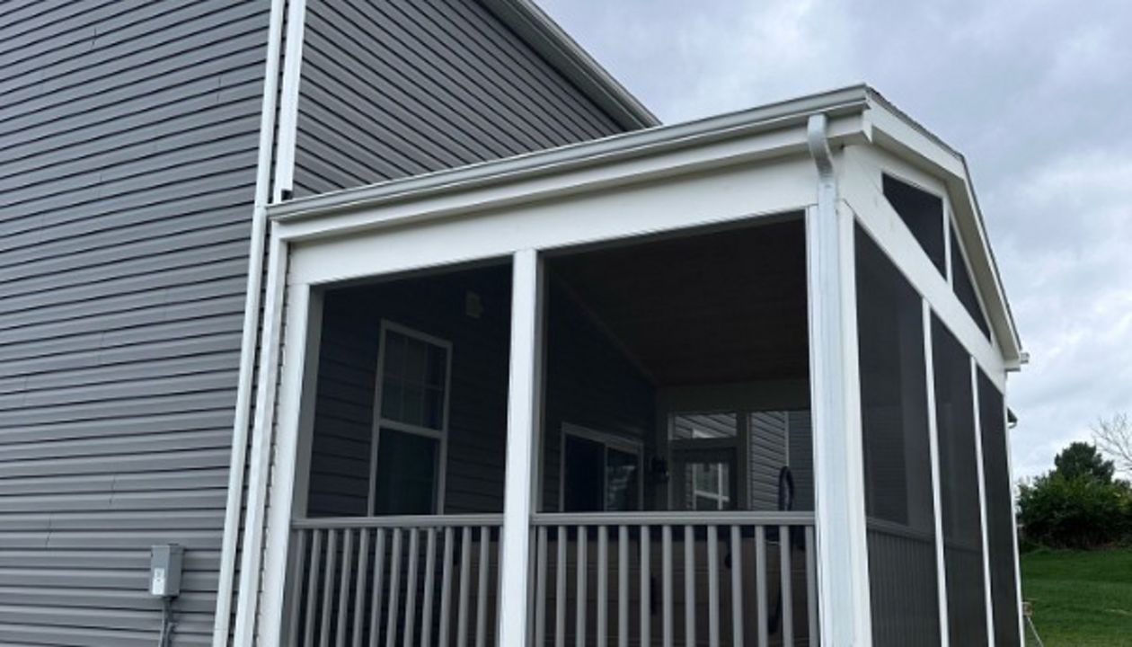 TREX Transcend classic white railing on a screened porch