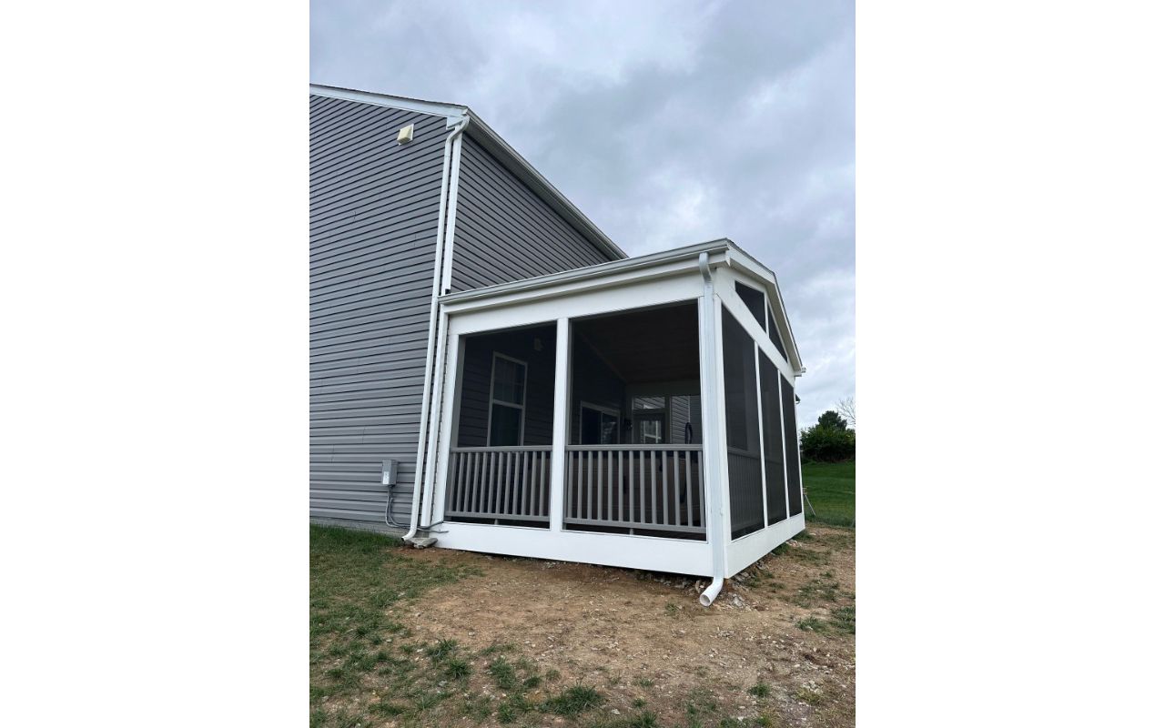 TREX Transcend classic white railing on a screened porch