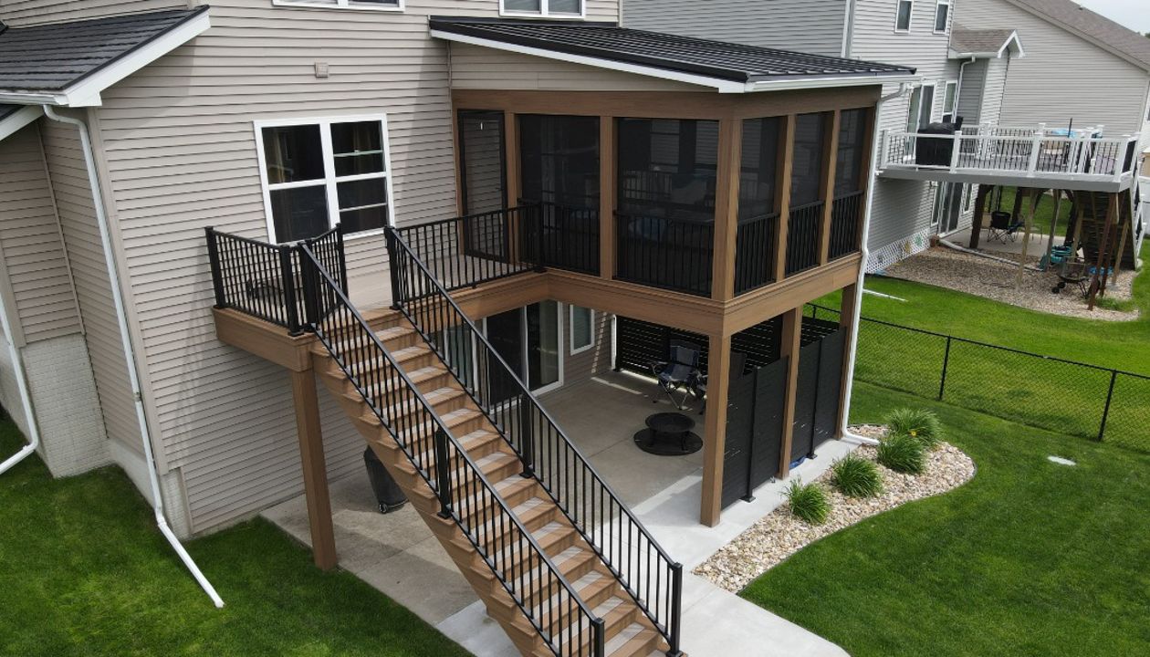 Trex Transcend Lineage decking with Jasper border and fascia.  Custom covered deck