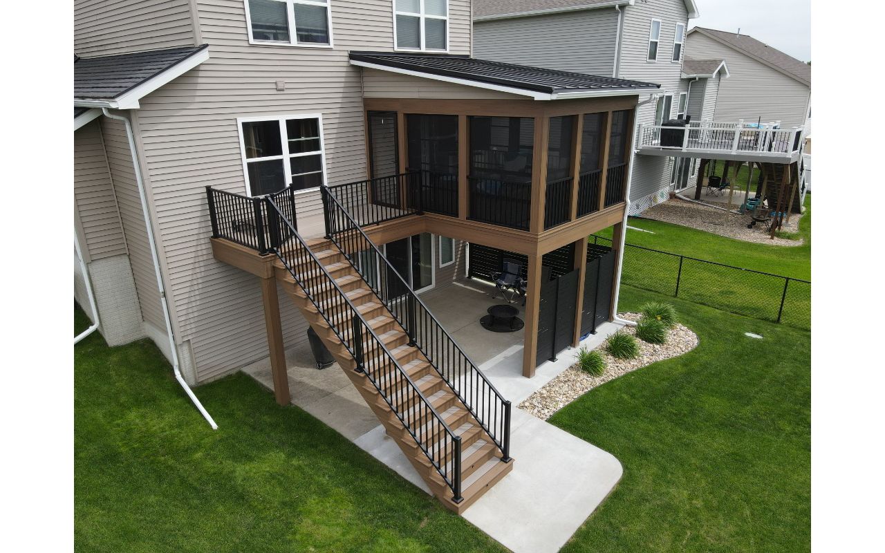 Trex Transcend Lineage decking with Jasper border and fascia.  Custom covered deck