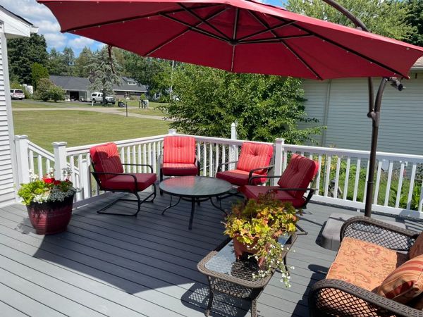 Clam Shell Decking with white railing.