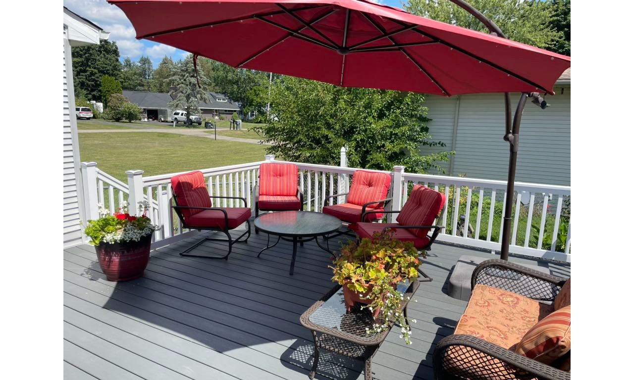 Clam Shell Decking with white railing.