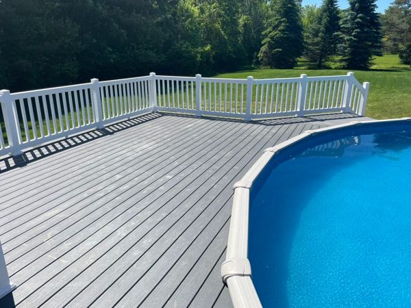 Clam Shell Decking with white railing.