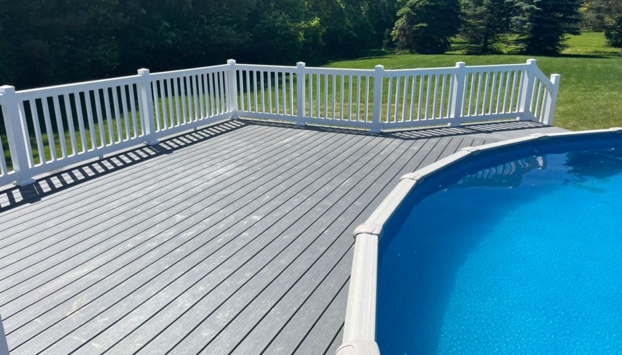 Clam Shell Decking with white railing.