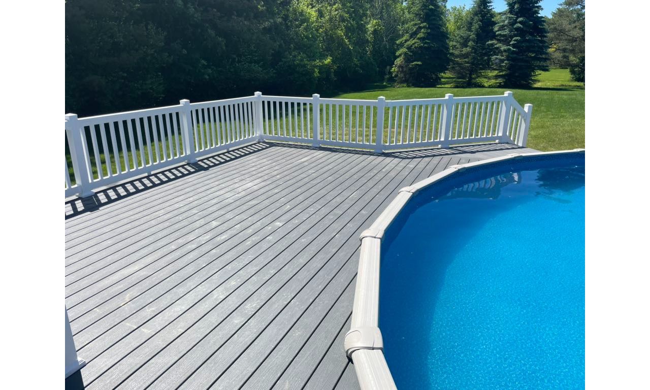 Clam Shell Decking with white railing.