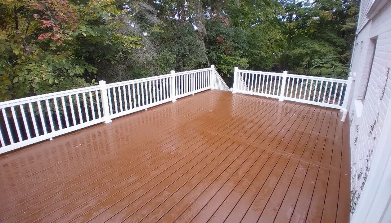 Saddle Decking with white railing.