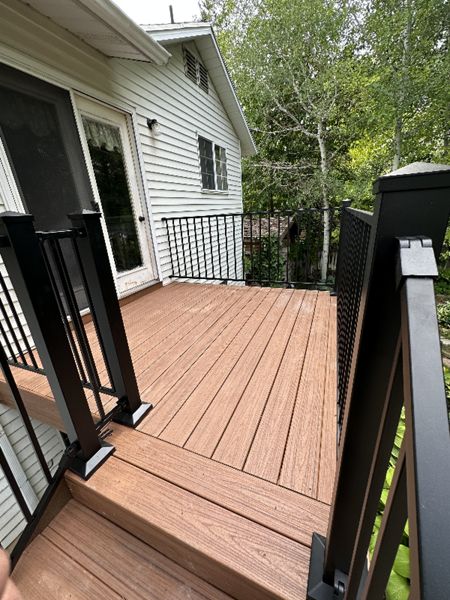 Warm, tropical tones meet modern lines in this beautiful build featuring Trex® Tiki Torch decking and sleek Cinch railing. It’s the perfect blend of natural style and low-maintenance performance — built to stand out and built to last.