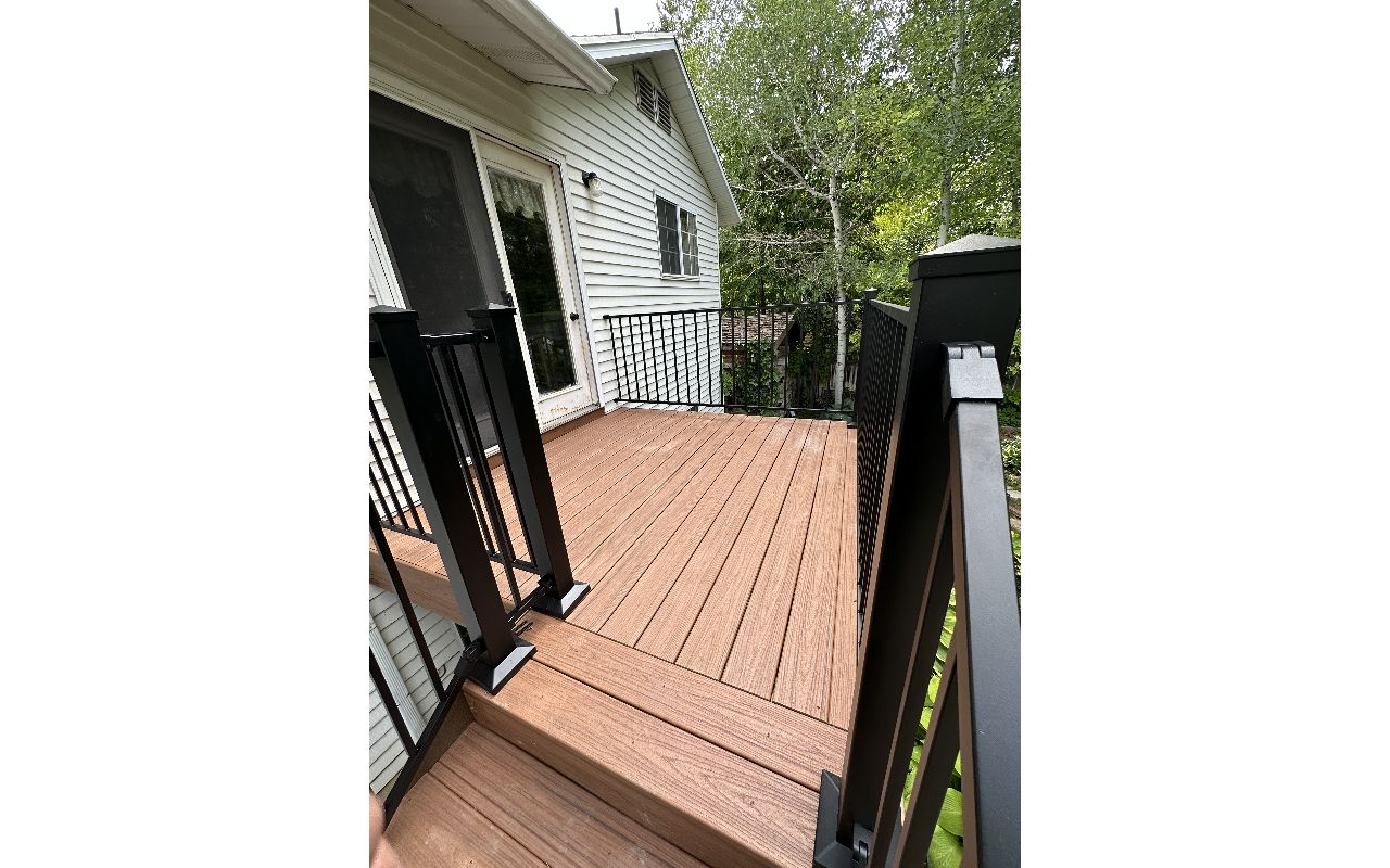 Warm, tropical tones meet modern lines in this beautiful build featuring Trex® Tiki Torch decking and sleek Cinch railing. It’s the perfect blend of natural style and low-maintenance performance — built to stand out and built to last.