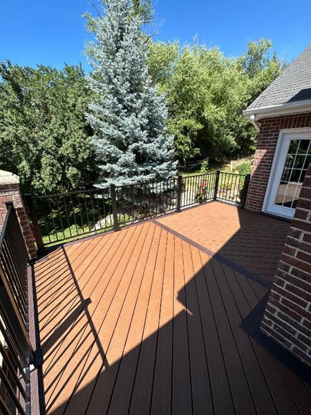 “Striking Tiki Torch decking laid at a bold 45°, framed with rich Saddle Select for contrast that commands attention — where craftsmanship meets creativity.