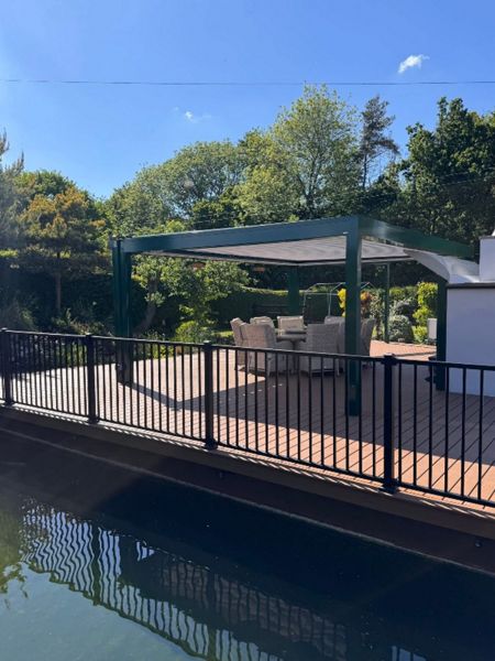 Trex signature Ocracoke decking with trex signature railing in charcoal.