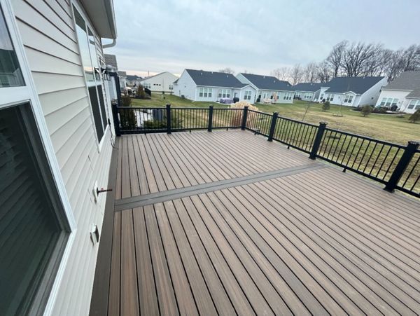 Not much can beat Toasted Sand decking complimented by Coast Bluff for the accents and Charcoal Black railing