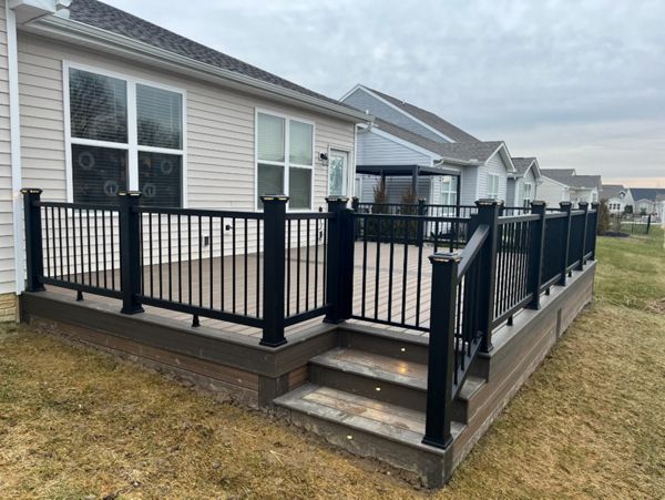 Not much can beat Toasted Sand decking complimented by Coast Bluff for the accents and Charcoal Black railing