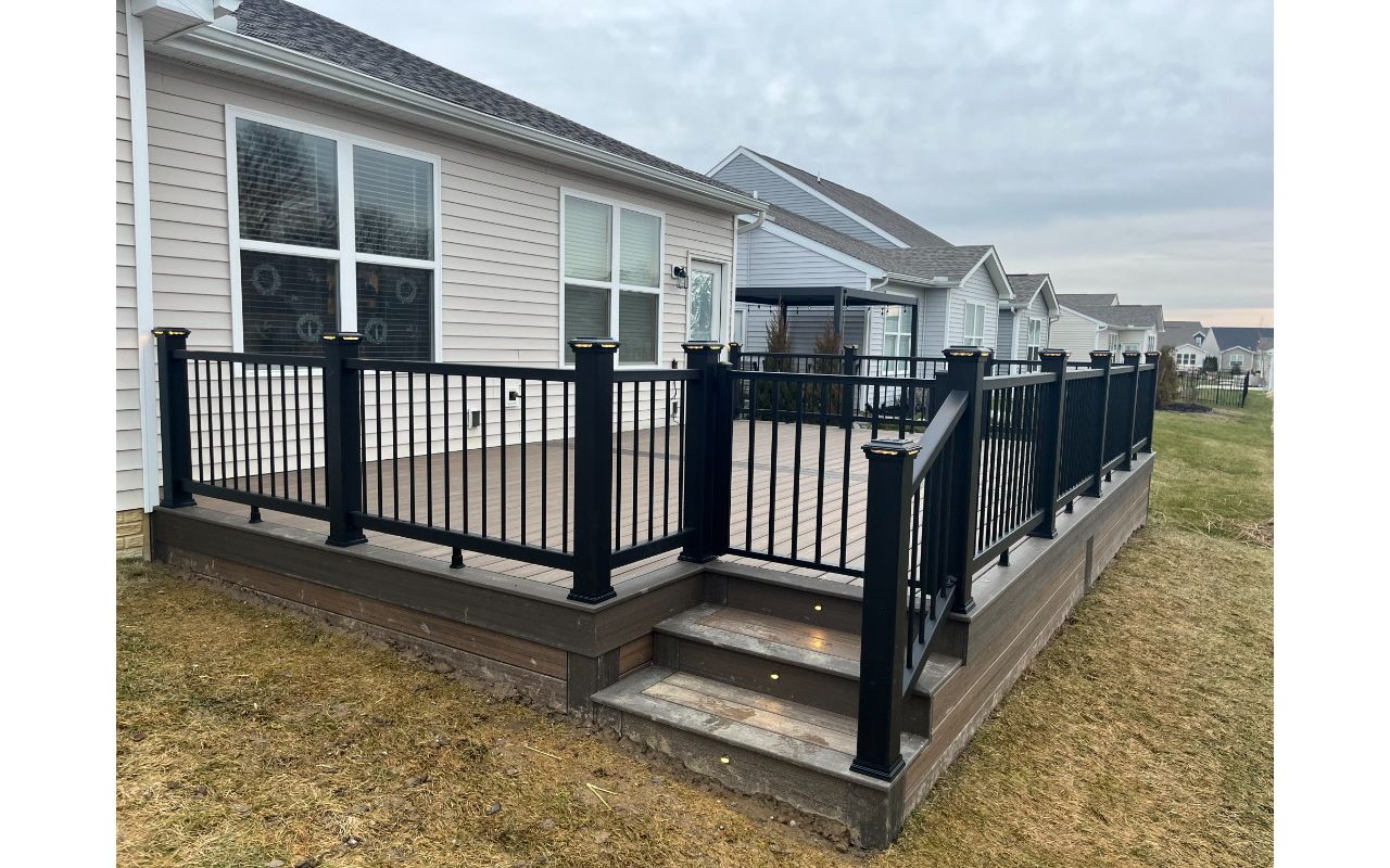 Not much can beat Toasted Sand decking complimented by Coast Bluff for the accents and Charcoal Black railing