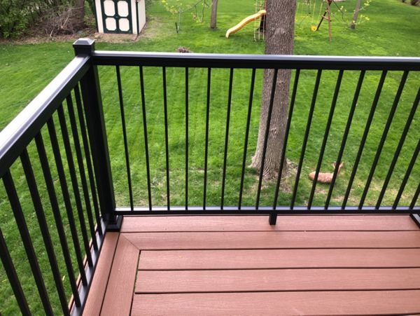 Low Maintenance Trex Composite Decking with Picture Frame Boarders and Low-Maintenance Aluminum Railing