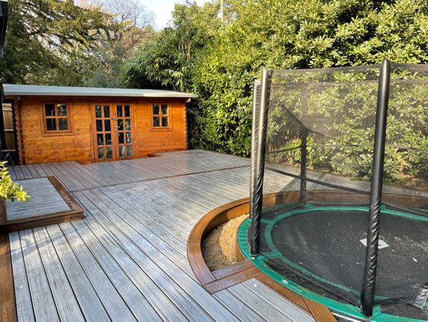 Trex custom curved Spiced Rum borders from The Transcend Tropicals Range with a Trex Transcend Tropicals Island Mist main in Cobham Surrey