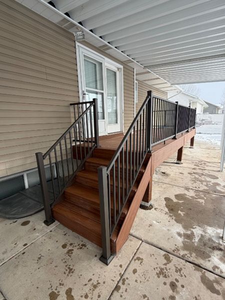200 sq ft of island vibes at home. Trex decking under a protective awning, finished with tiki torch for the perfect evening hangout.